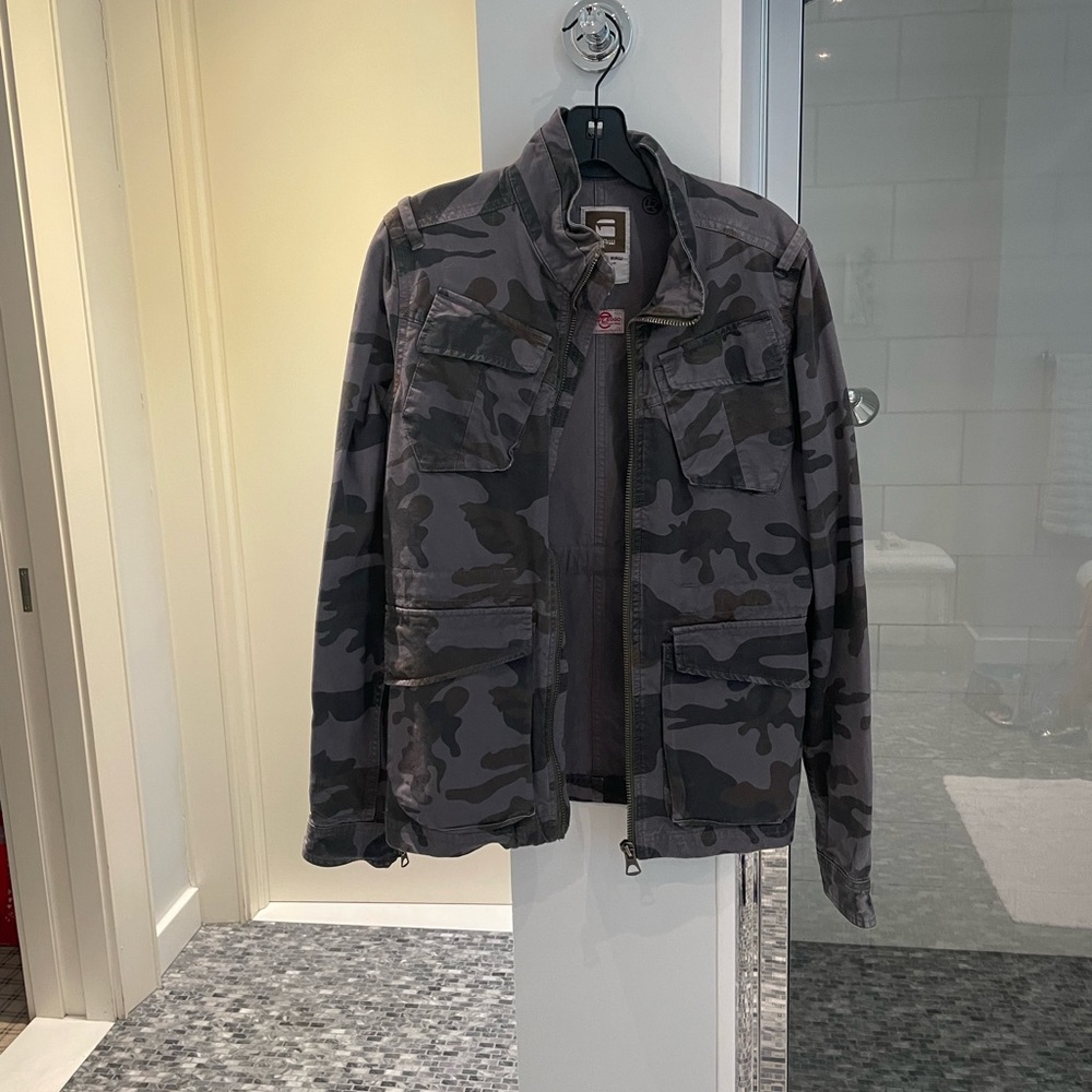 This G-Star Raw army style jacket is a combination of blue and black.